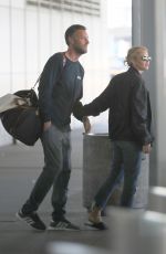 JENNIFER LAWRENCE and Cooke Maroney at JFK Airport in New York 08/23/2018