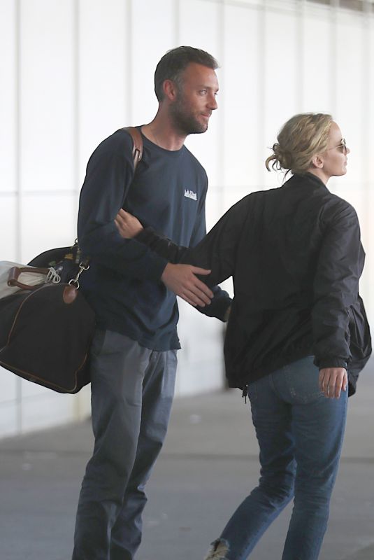 JENNIFER LAWRENCE and Cooke Maroney at JFK Airport in New York 08/23/2018