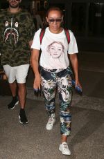 MELANIE BROWN at LAX Airport in Los Angeles 08/20/2018