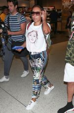 MELANIE BROWN at LAX Airport in Los Angeles 08/20/2018