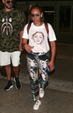 MELANIE BROWN at LAX Airport in Los Angeles 08/20/2018