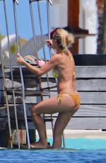 MICHELLE HUNZIKER in Bikinis on the Beach in Maldives 08/12/2018