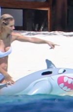 MICHELLE HUNZIKER in Bikinis on the Beach in Maldives 08/12/2018