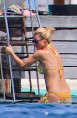 MICHELLE HUNZIKER in Bikinis on the Beach in Maldives 08/12/2018