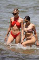 OLIVIA CULPO and DEVON WINDSOR in Bikinis at a Beach in Miami 08/13/2018