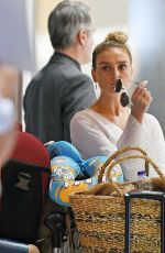 PERRIE EDWARDS at Heathrow Airport in London 08/12/2018