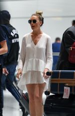 PERRIE EDWARDS at Heathrow Airport in London 08/12/2018