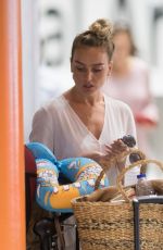 PERRIE EDWARDS at Heathrow Airport in London 08/12/2018