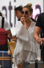 PERRIE EDWARDS at Heathrow Airport in London 08/12/2018