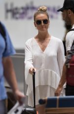 PERRIE EDWARDS at Heathrow Airport in London 08/12/2018