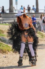 PHOEBE PRICE in Bikini Skating on Venice Beach 08/05/2018