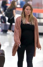 Pregnant HILARY DUFF at JFK Airport in New York 08/26/2018