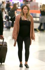 Pregnant HILARY DUFF at JFK Airport in New York 08/26/2018