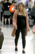Pregnant HILARY DUFF at JFK Airport in New York 08/26/2018