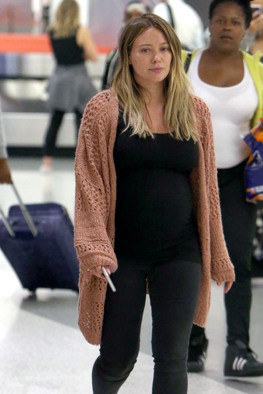 Pregnant HILARY DUFF at JFK Airport in New York 08/26/2018