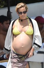 Pregnant KATE HUDSON in Bikini at a Pool in Ojai 07/28/2018