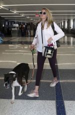 Pregnant KATE UPTON at Los Angeles International Airport 08/27/2018
