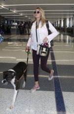 Pregnant KATE UPTON at Los Angeles International Airport 08/27/2018
