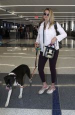 Pregnant KATE UPTON at Los Angeles International Airport 08/27/2018