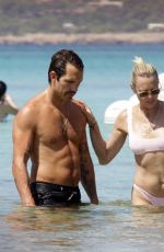 ROBIN WRIGHT in Bikini at a Beach in Formentera 08/21/2018