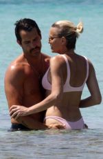 ROBIN WRIGHT in Bikini at a Beach in Formentera 08/21/2018