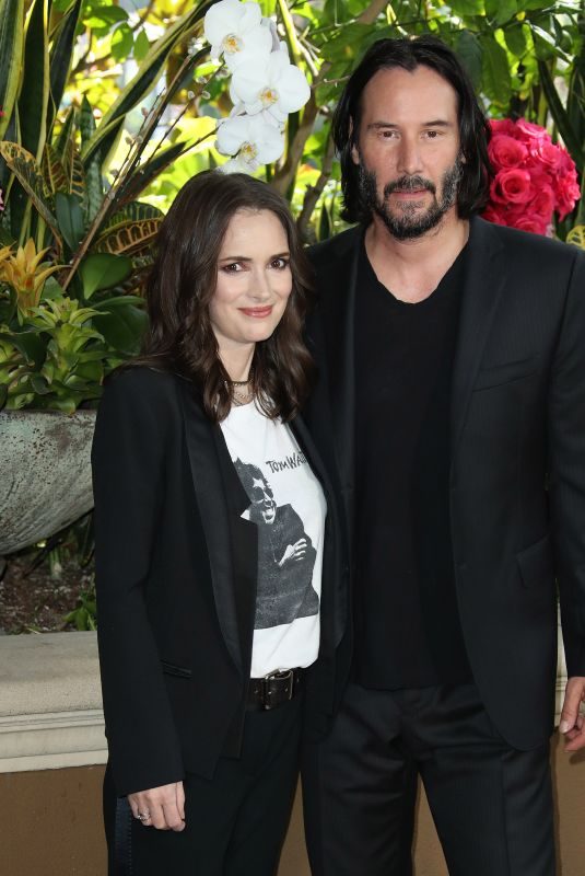 WINONA RYDER and Keanu Reeves at Destination Wedding Photocall in Beverly Hills 08/18/2018