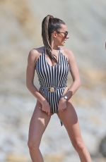 AMBER DAVIES in Swimsuit on the Beach in Ibiza 08/31/2018