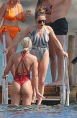 AMBER DAVIES in Swimsuit on the Beach in Ibiza 08/31/2018
