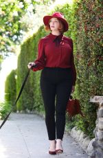 CHRISTINA HENDRICKS Out with Her Dog in Los Angeles 09/04/2018