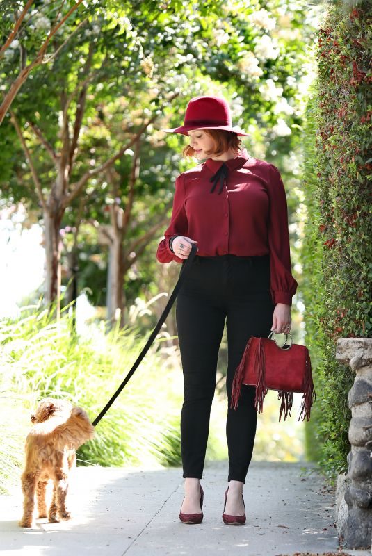 CHRISTINA HENDRICKS Out with Her Dog in Los Angeles 09/04/2018