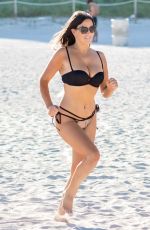 CLAUDIA ROMANI in Bikini on the Beach in Miami 09/26/2018