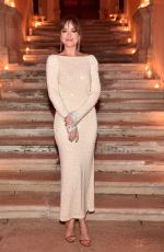 DAKOTA JOHNSON at a Venice Film Festival Cocktail Party 09/02/2018