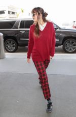DAKOTA JOHNSON at LAX Airport in Los Angeles 09/26/2018