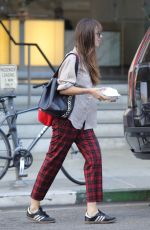DAKOTA JOHNSON Out in Beverly Hills 09/24/2018