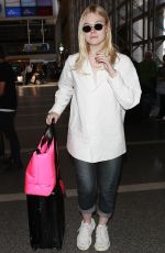 ELLE FANNING at LAX Airport in Los Angeles 09/28/2018