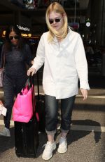 ELLE FANNING at LAX Airport in Los Angeles 09/28/2018