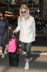 ELLE FANNING at LAX Airport in Los Angeles 09/28/2018
