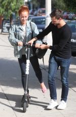 KENDRA WILKINSON Rides a Scooter Out in West Hollywood 09/21/2018