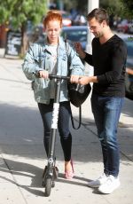 KENDRA WILKINSON Rides a Scooter Out in West Hollywood 09/21/2018