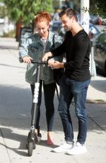KENDRA WILKINSON Rides a Scooter Out in West Hollywood 09/21/2018