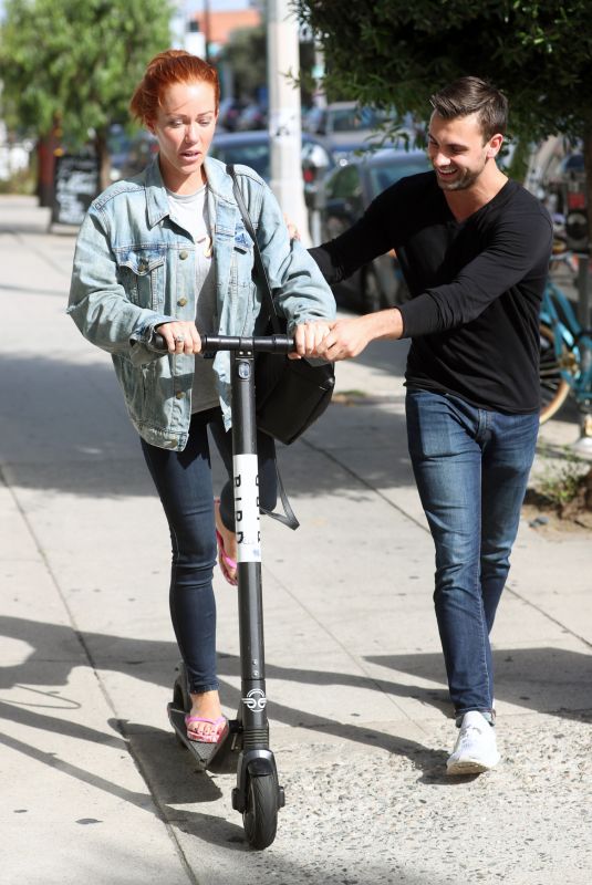 KENDRA WILKINSON Rides a Scooter Out in West Hollywood 09/21/2018