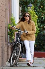 KERI RUSSELL Riding a Bike Out in New York 09/24/2018