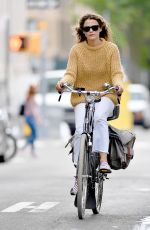 KERI RUSSELL Riding a Bike Out in New York 09/24/2018