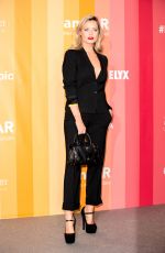 LAURA WHITMORE at Amfar Gala in Milan 09/22/2018