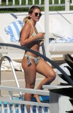 LOUISA JOHNSON in Bikini at a Pool in Marbella 09/23/2018