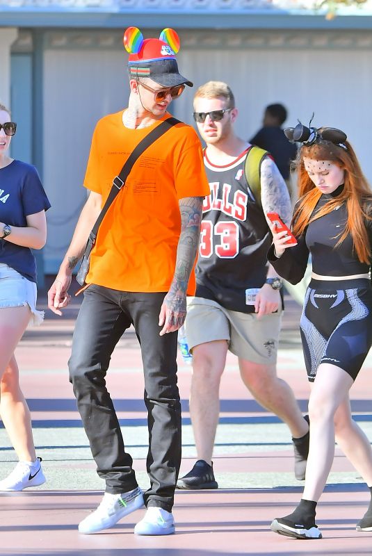 MADELAINE PETSCH and Travis Mills Leaves Disneyland in Anaheim 09/18/2018