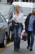 MICHELLE HUNZIKER Arrives at Airport in Milan 08/31/2018