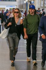OLIVIA WILDE and Jason Sudekis at LAX Airport in Los Angeles 09/27/2018
