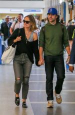 OLIVIA WILDE and Jason Sudekis at LAX Airport in Los Angeles 09/27/2018