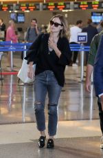 OLIVIA WILDE and Jason Sudekis at LAX Airport in Los Angeles 09/27/2018
